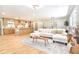 Open floor plan featuring a modern kitchen, dining area, and living room with hardwood floors at 642 Austin Se Dr, Smyrna, GA 30082