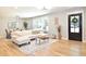 Inviting living room with hardwood floors, dining area, and ample natural light at 642 Austin Se Dr, Smyrna, GA 30082