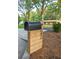 Close-up of a classic mailbox with the house number displayed on a wooden post at 642 Austin Se Dr, Smyrna, GA 30082