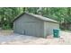 A shed with storage for your tools and toys sits in this home's private backyard at 642 Austin Se Dr, Smyrna, GA 30082