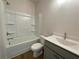 Clean bathroom with a shower-tub combination, toilet, and vanity with a sink at 1408 Cozy Court # 303, Atlanta, GA 30315