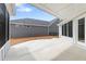 Covered patio with ample space for outdoor living at 325 Sassafras W Way, Holly Springs, GA 30115