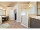 Spacious bathroom features tile flooring, a glass shower, and double vanity sinks for a luxurious experience at 586 Devon Brooke Dr, Woodstock, GA 30188