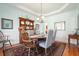 Elegant dining room featuring classic furnishings and soft, neutral decor at 586 Devon Brooke Dr, Woodstock, GA 30188