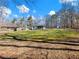 Picture of a backyard, featuring a lush lawn and a tranquil view of the surrounding landscape at 6734 Pass Road, Buford, GA 30518