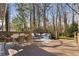 Large backyard deck offers a great space for outdoor dining and relaxation at 2858 Skyland Ne Dr, Brookhaven, GA 30341