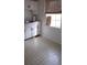 Functional kitchen space with wood floors and natural light at 4622 Dogwood Rd, Pine Lake, GA 30083