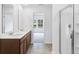 Bright bathroom features a double vanity and walk-in shower at 203 Groveton Ct, Euharlee, GA 30145