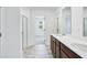 Spacious bathroom featuring double sinks, a glass shower, and ample counter space at 203 Groveton Ct, Euharlee, GA 30145