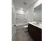 Bathroom featuring a vanity, toilet and a shower-tub combo at 203 Groveton Ct, Euharlee, GA 30145