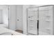 Modern bathroom featuring a glass-enclosed shower and neutral color scheme for a sleek look at 203 Groveton Ct, Euharlee, GA 30145