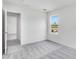Bedroom with a view and grey carpet at 203 Groveton Ct, Euharlee, GA 30145