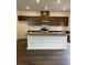 Spacious kitchen featuring stainless steel appliances, granite countertops, and modern cabinetry at 203 Groveton Ct, Euharlee, GA 30145