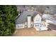 An aerial view of the house with a large backyard and patio at 3402 Blaisdell Rd, Buford, GA 30519