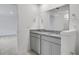 Bathroom featuring granite counters and a double sink at 362 Rock View Ln, Covington, GA 30016