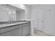 Granite counters and dual sinks adorn this pristine bathroom at 362 Rock View Ln, Covington, GA 30016