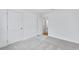 This bedroom has carpeted floors and a view into the hallway at 362 Rock View Ln, Covington, GA 30016