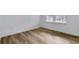 Bright bedroom features durable flooring and a large window, offering plenty of natural light at 362 Rock View Ln, Covington, GA 30016