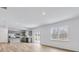 Bright open-concept living area leads into a kitchen and a large window with lots of natural light at 362 Rock View Ln, Covington, GA 30016