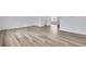 Bright open-concept living area features durable flooring and neutral walls with natural light at 362 Rock View Ln, Covington, GA 30016