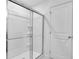 A stand-up shower with sliding glass doors at 362 Rock View Ln, Covington, GA 30016