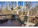 Outdoor living space showing deck with seating area, tables, and lots of trees at 387 Pine Trail, Canton, GA 30115