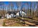 Charming one-story home with a cozy front porch and well-maintained landscaping at 387 Pine Trail, Canton, GA 30115
