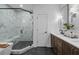 Luxurious bathroom showcasing a soaking tub, glass-enclosed shower, and double vanity with contemporary finishes at 315 Chiswick Cir # 38, Alpharetta, GA 30009