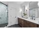 Modern bathroom featuring double vanity, tiled shower, and sleek fixtures creating a spa-like experience at 315 Chiswick Cir # 38, Alpharetta, GA 30009