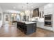 Beautiful kitchen featuring a large island with seating, stainless steel appliances, and dining area at 315 Chiswick Cir # 38, Alpharetta, GA 30009
