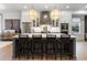 Bright, open kitchen with a central island, bar stools, and stainless steel appliances at 315 Chiswick Cir # 38, Alpharetta, GA 30009