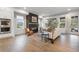 Spacious living room with a fireplace, large windows, and an open layout, perfect for entertaining and relaxing at 315 Chiswick Cir # 38, Alpharetta, GA 30009