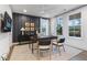 A home office features a ceiling fan and large windows, offering ample natural light at 315 Chiswick Cir # 38, Alpharetta, GA 30009