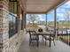 Covered patio featuring outdoor seating overlooking the backyard at 315 Chiswick Cir # 38, Alpharetta, GA 30009