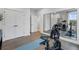 Workout room features mirrored walls and hardwood flooring, perfect for fitness enthusiasts at 315 Chiswick Cir # 38, Alpharetta, GA 30009