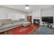 Cozy living room with fireplace, large sofa, and ample natural light at 3669 Clearbrooke Way, Duluth, GA 30097