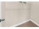 Functional walk-in closet offering plenty of room for clothes and personal items at 4478 Dunblane Ave, Sugar Hill, GA 30518