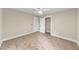 Spacious bedroom with two closets and ceiling fan at 703 Sierra Ct, Canton, GA 30114