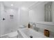 Modern bathroom with a walk-in shower and stylish fixtures at 3185 Delhi Dr, Powder Springs, GA 30127
