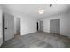 Spacious bedroom with plush carpeting, featuring a double closet and an attached bathroom at 3185 Delhi Dr, Powder Springs, GA 30127