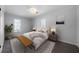 Cozy bedroom featuring neutral tones, plush carpet, and natural lighting at 3185 Delhi Dr, Powder Springs, GA 30127