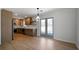 Bright kitchen boasts stainless appliances, quartz counters, and a stylish backsplash at 3185 Delhi Dr, Powder Springs, GA 30127