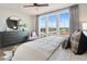 This bedroom features a large window, a dresser and chair with a great view at 962 Bibbs Circle # 5, Atlanta, GA 30318