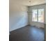 The modern dining area has hard wood floors, a modern light fixture and natural lighting at 962 Bibbs Circle # 5, Atlanta, GA 30318