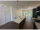 Bright open kitchen with center island featuring a sink and stainless steel appliances at 962 Bibbs Circle # 5, Atlanta, GA 30318