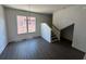 Living area with modern flooring and a staircase at 962 Bibbs Circle # 5, Atlanta, GA 30318