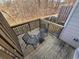 Cozy balcony includes outdoor seating with a wooded view at 2256 Triple Crown Ln, Lithonia, GA 30058