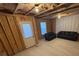 Unfinished basement with framed walls, exposed ceiling, and seating area at 2256 Triple Crown Ln, Lithonia, GA 30058