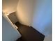 A carpeted staircase descends in this well-lit view of the home at 2256 Triple Crown Ln, Lithonia, GA 30058