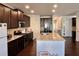 Bright kitchen features a large center island, modern appliances, and ample cabinet space at 2359 Brynfield Cv, Suwanee, GA 30024